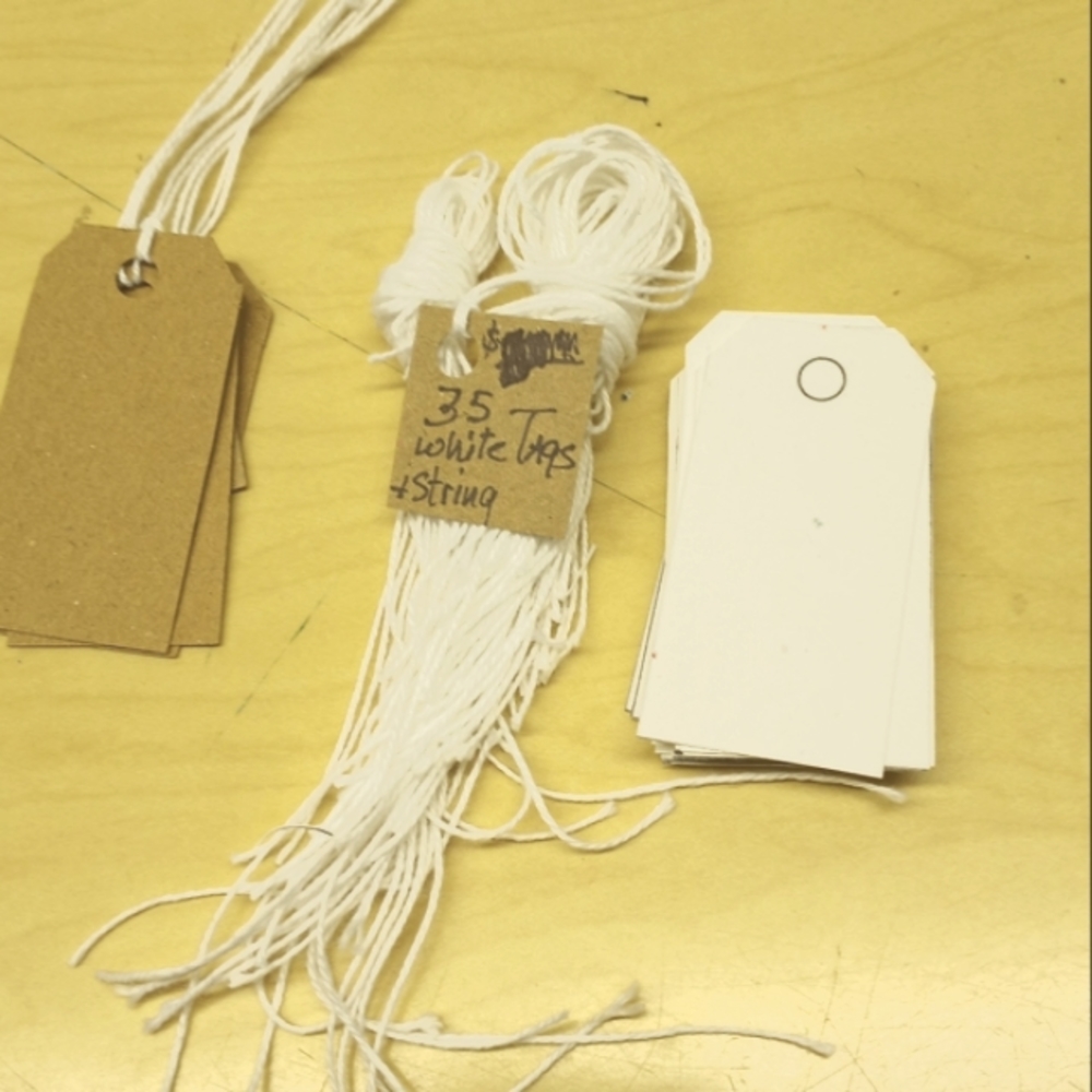 35 White 2sided Card StockHanging Price Tags. Die cut with Strings.